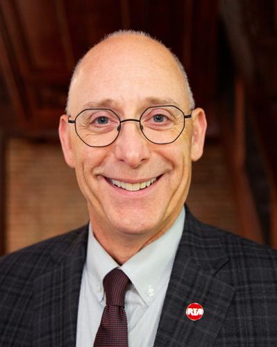  Board member: Shaker Heights Mayor David E. Weiss