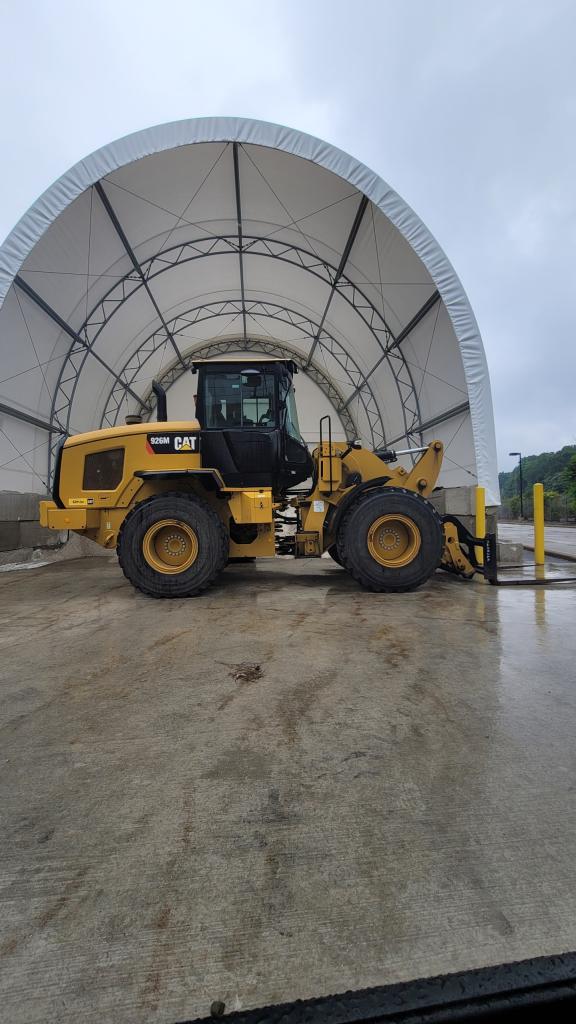 Loads salt into our trucks in the winter and any other large lifting and loading needs.